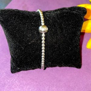 7.5” stealing silver bracelet. Used for display only.